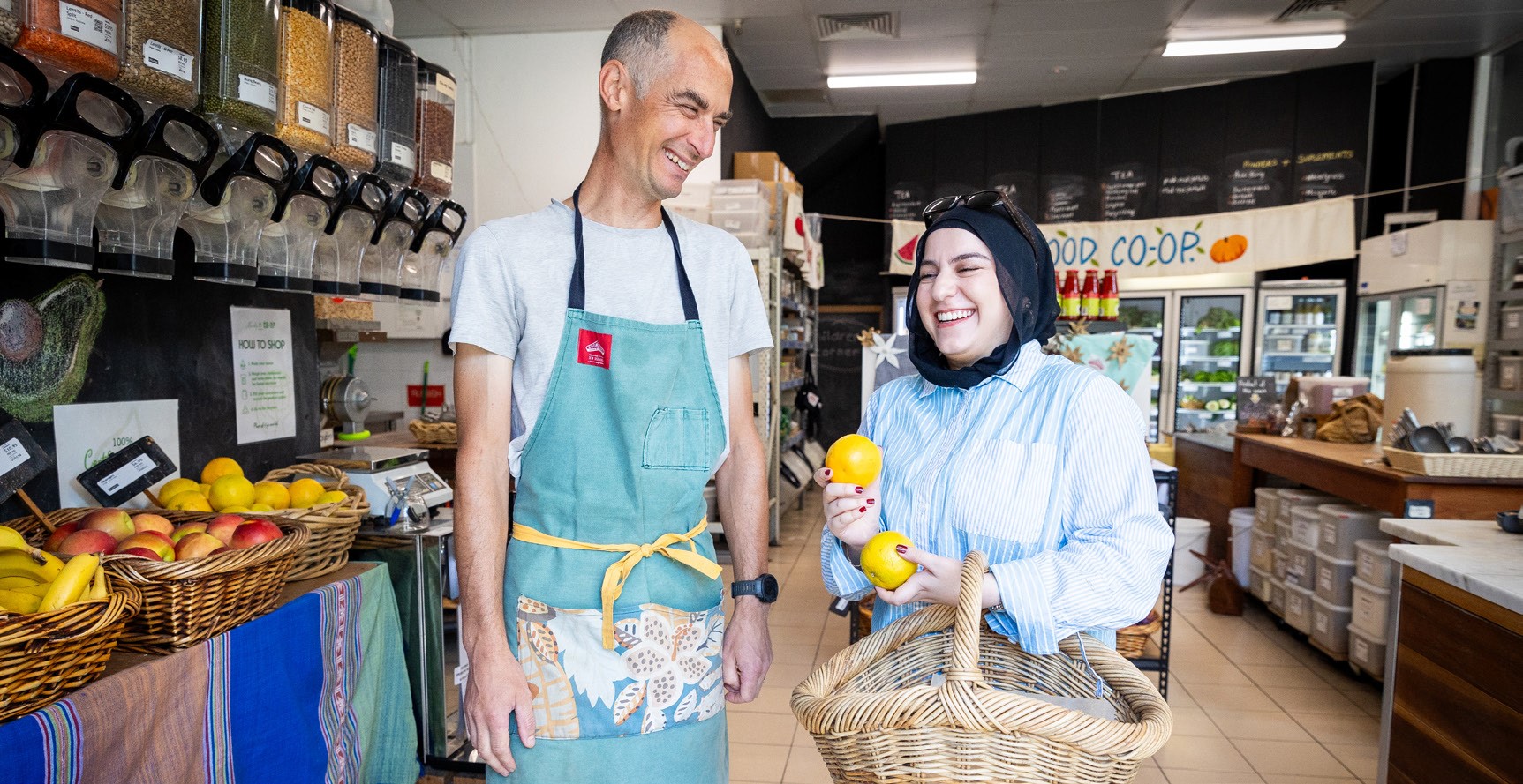 Image of small business owner helping a customer